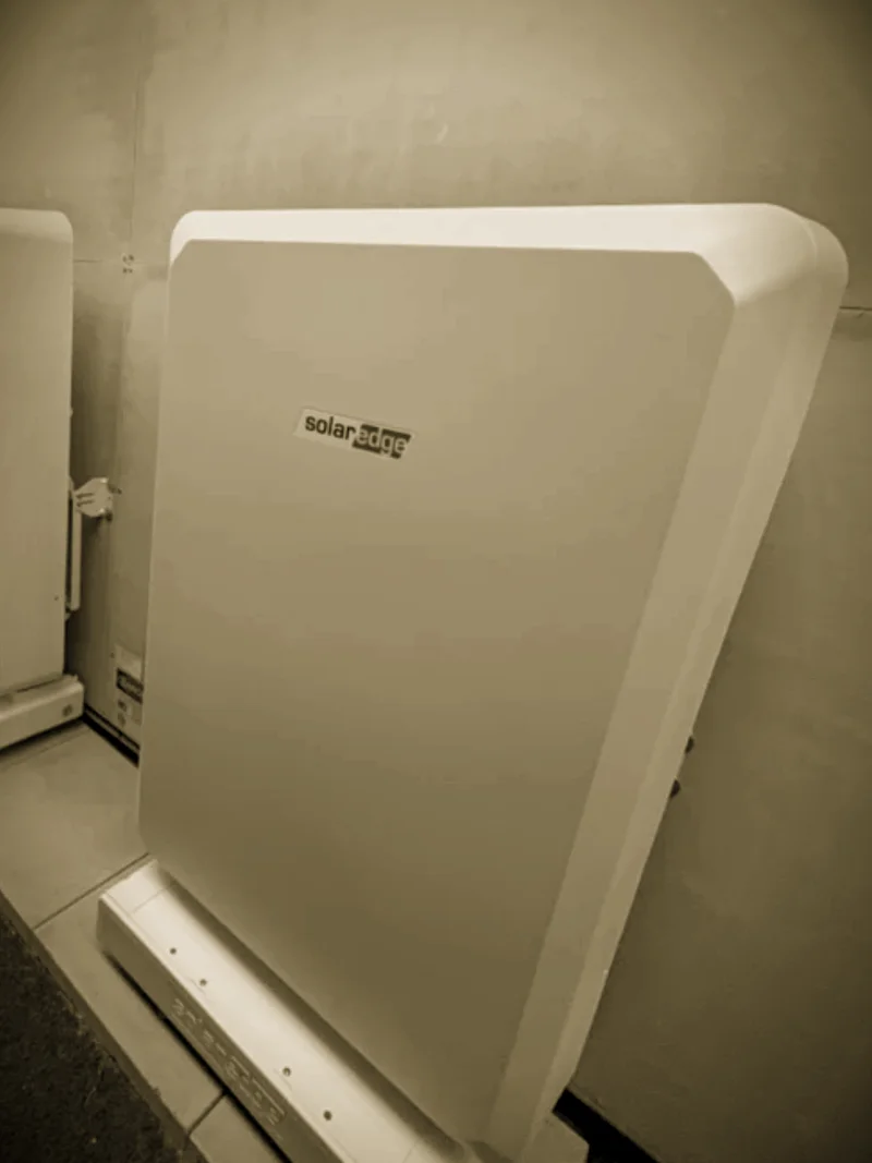 Two floor-standing SolarEdge batteries installed by Primero along a wall
